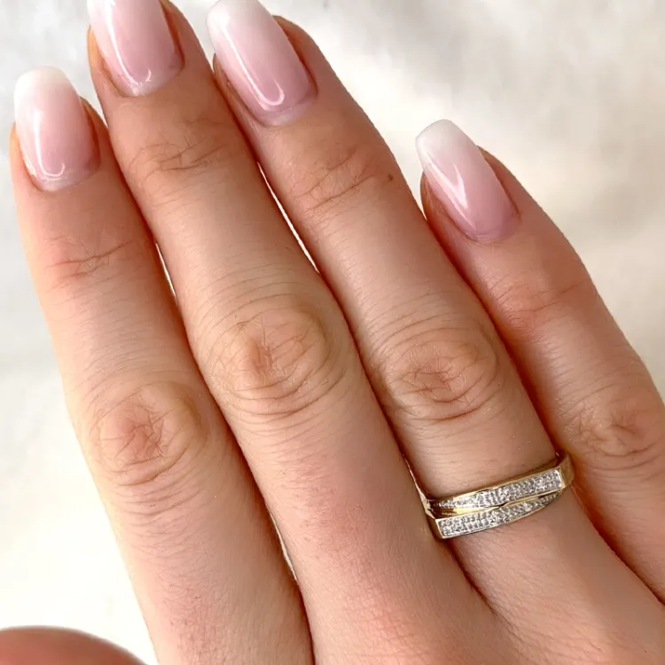 abstrakt diamant ring i 9 karat guld.- og hvidguld 0,03 ct