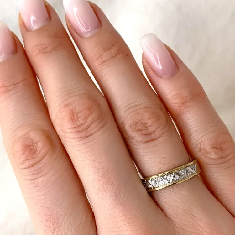abstrakt diamant ring i 9 karat guld.- og hvidguld 0,04 ct