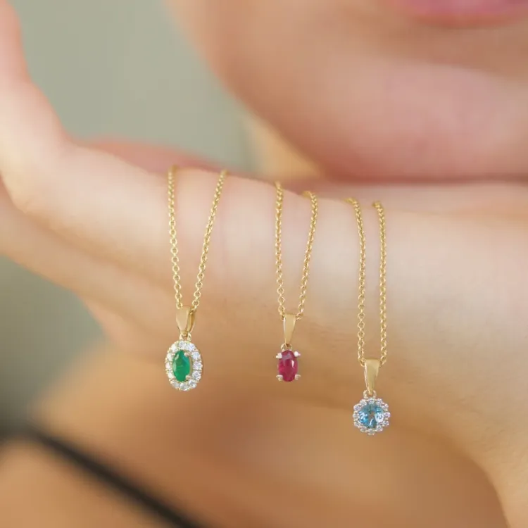 Elegant rundt topas diamantvedhæng i 9 karat guld 0,07 ct 0,30 ct