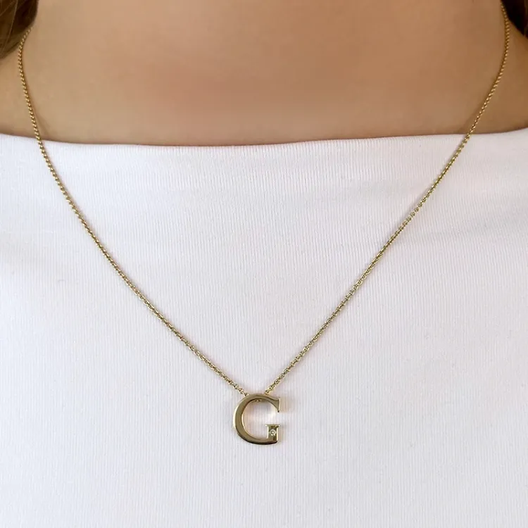 bogstav G diamant vedhæng i 9 karat guld 0,01 ct