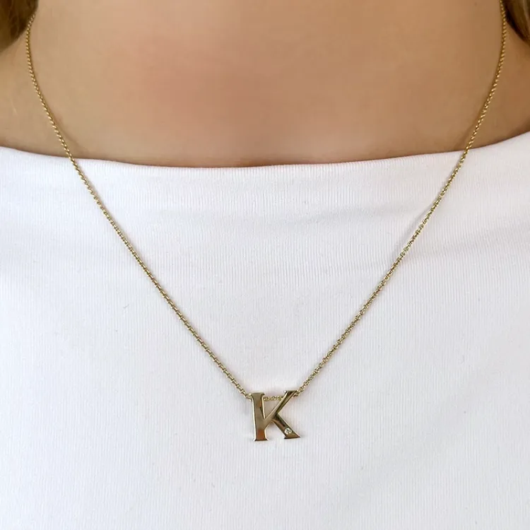 bogstav K diamant vedhæng i 9 karat guld 0,01 ct