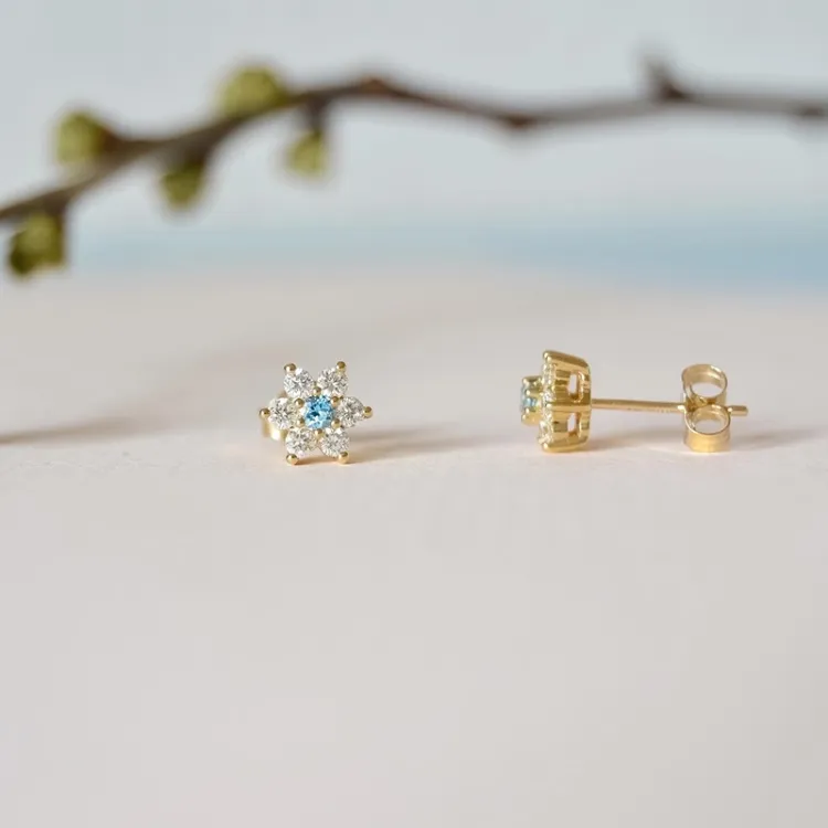 blomster topas diamantøreringe i 9 karat guld med diamant og topas