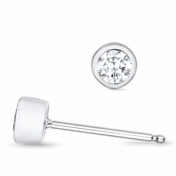 2 x 0,15 ct Kampagne - solitaireørestikker i 14 karat hvidguld med diamant