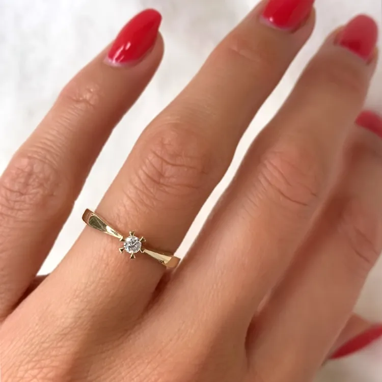 0,10 ct diamant solitairering i 14 karat guld 0,10 ct