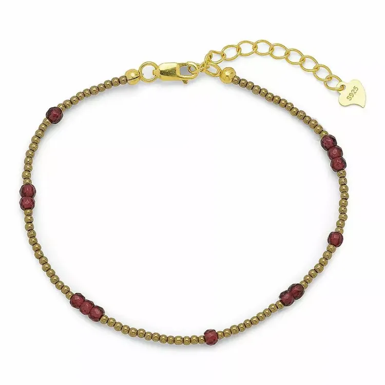 Forgyldt sten armbånd med hematite og granat.