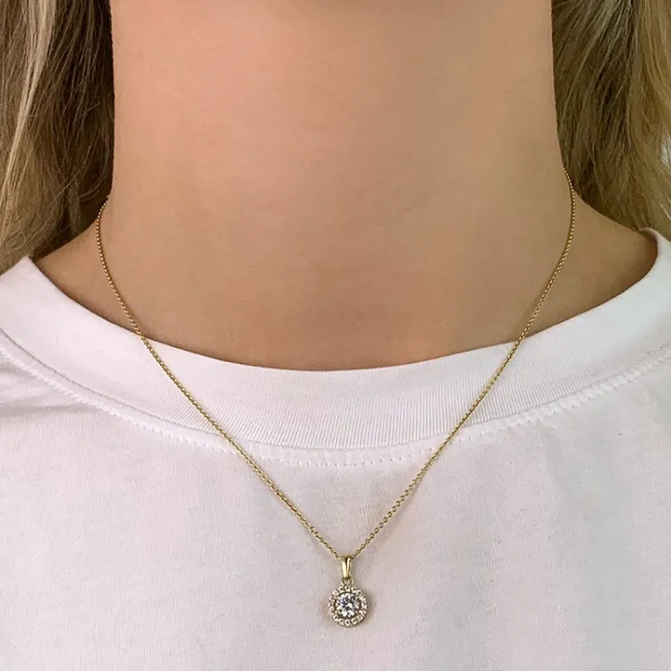 rundt zirkon vedhæng i 9 karat guld