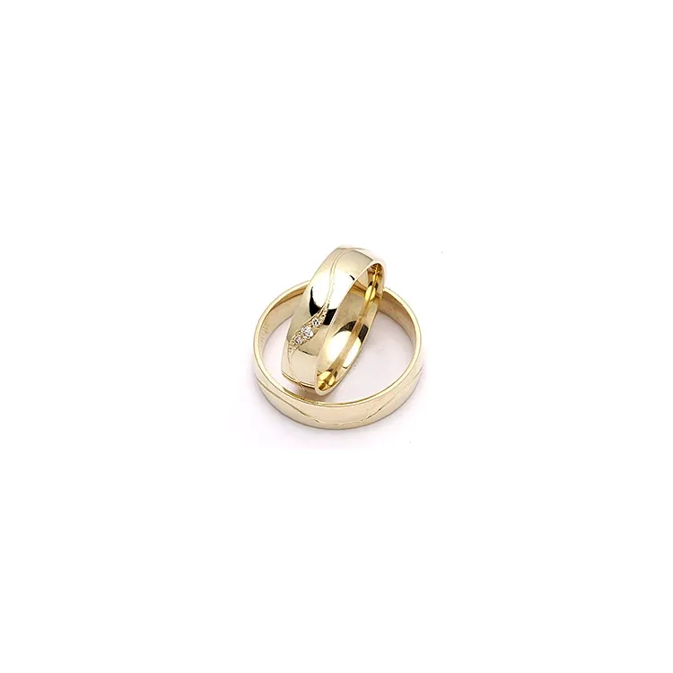 vielsesringe i 9 karat guld 0,036 ct - sæt