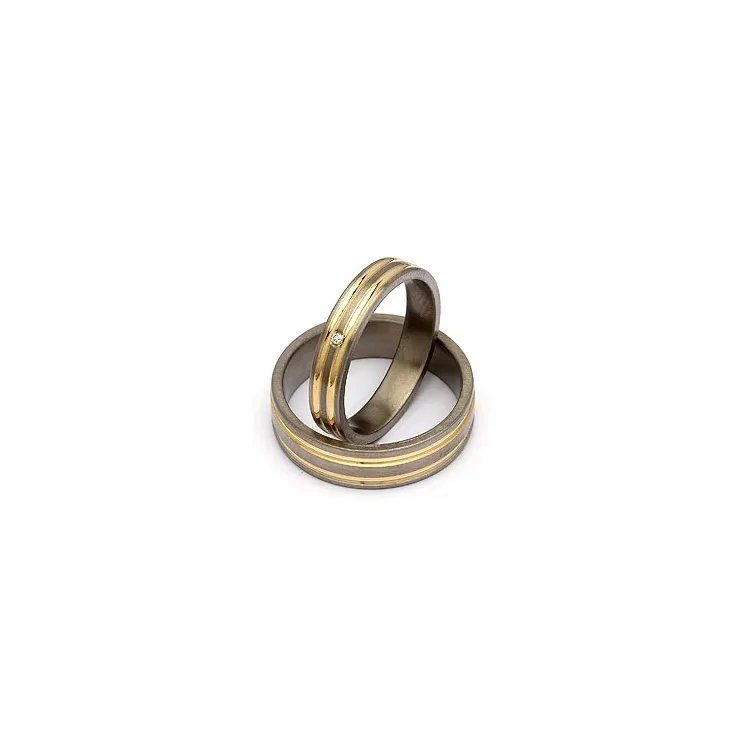 Vielsesringe i titanium og alm. guld 0,025 ct