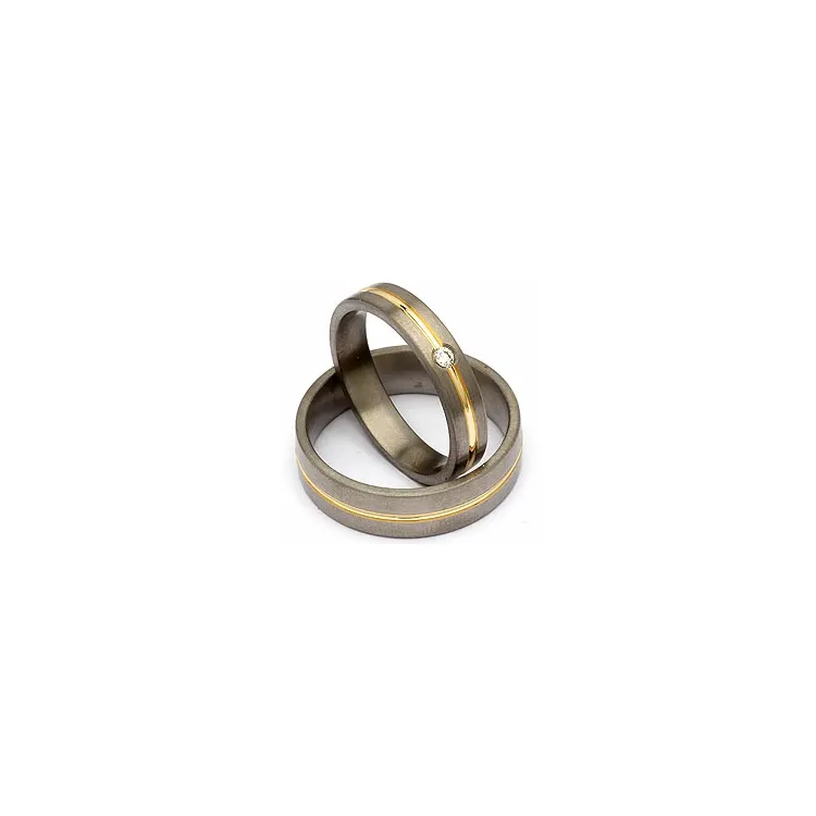 Vielsesringe i titanium og alm. guld 0,04 ct