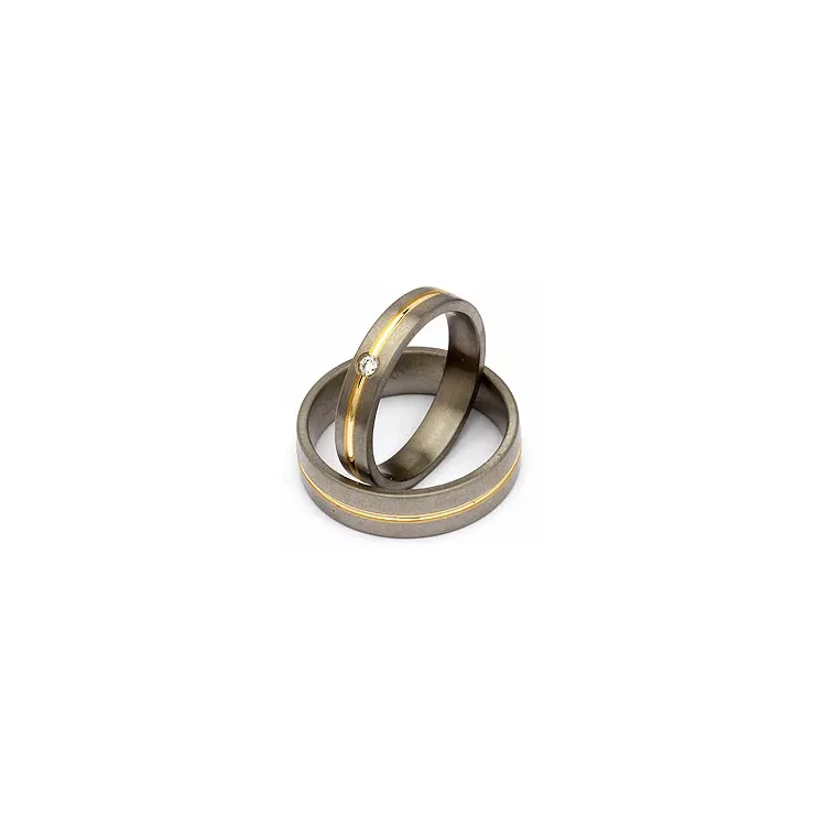 Vielsesringe i titanium og alm. guld 0,04 ct
