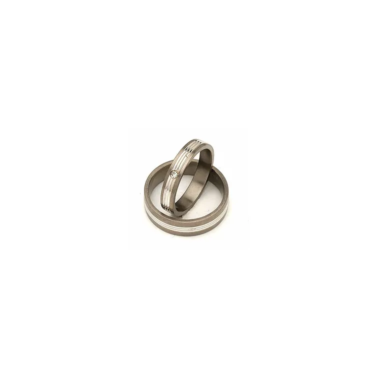 Vielsesringe i 14 karat titanium og alm. guld 0,025 ct