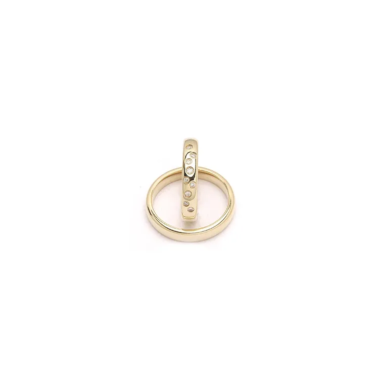 stjernedrys vielsesringe i 9 karat guld 0,126 ct - sæt