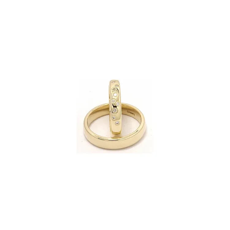 stjernedrys vielsesringe i 9 karat guld 0,126 ct - sæt