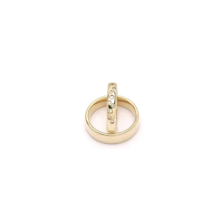 Stjernedrys vielsesringe i 9 karat guld 0,126 ct - sæt
