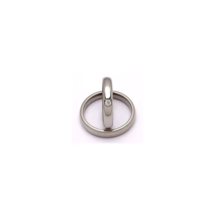 Vielsesringe i titanium 0,05 ct
