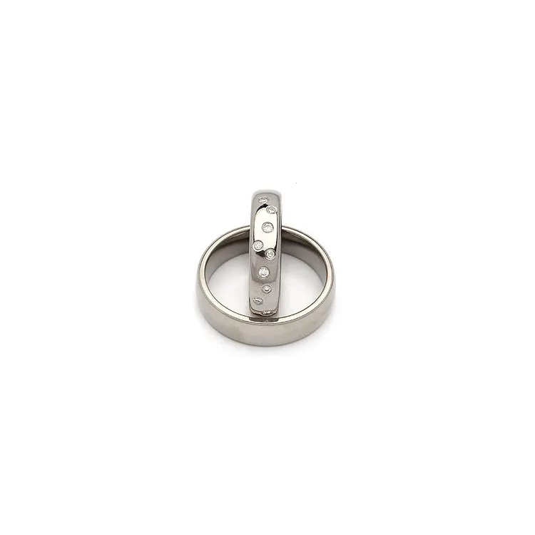 Vielsesringe i titanium 0,126 ct