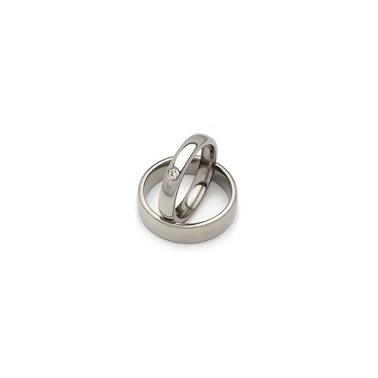 Vielsesringe i titanium 0,05 ct