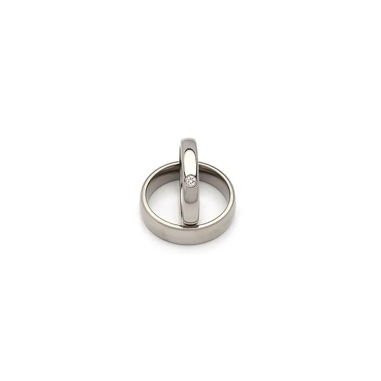 Vielsesringe i titanium 0,05 ct
