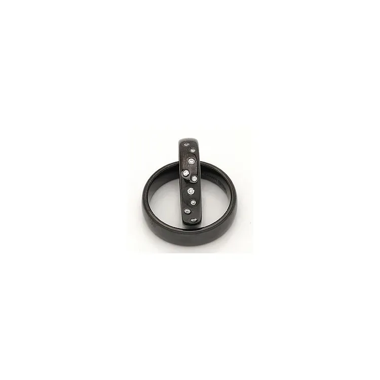 Vielsesringe i sort stål 0,126 ct