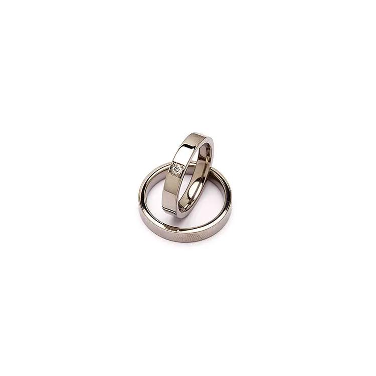 Vielsesringe i titanium 0,05 ct
