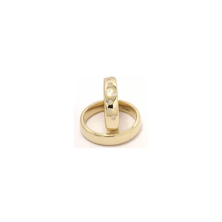 stjernedrys vielsesringe i 14 karat guld 0,126 ct - sæt