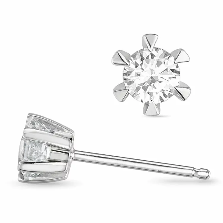 2 x 0,20 ct diamant solitaireørestikker i 14 karat hvidguld med diamant