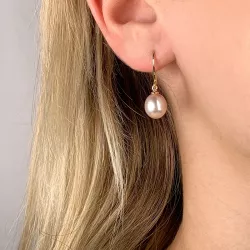 Ovale 8 - 9 mm aaa-graded ferskvandsperle øreringe i 14 karat guld med 