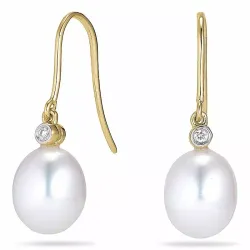 Ovale 8 - 9 mm aaa-graded ferskvandsperle diamantøreringe i 14 karat guld med diamanter