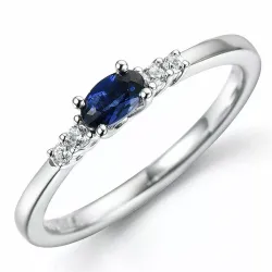 oval safir diamantring i 14 karat hvidguld 0,35 ct 0,06 ct