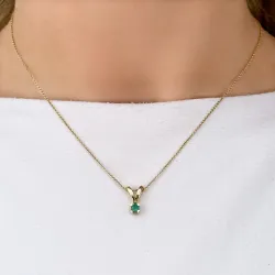 grøn smaragd vedhæng i 14 karat guld 0,22 ct