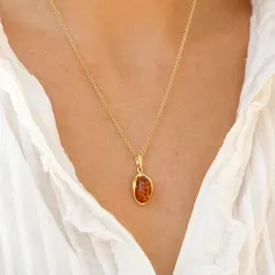 ovalt rav vedhæng i forgyldt sølv