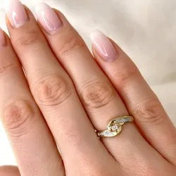 abstrakt diamantring i 9 karat guld.- og hvidguld 0,05 ct