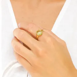 lysegrøn krystal ring i forgyldt messing