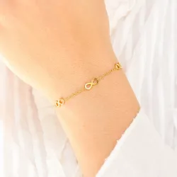 vandfast infinity armbånd i forgyldt stål - OCEANA