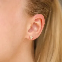 vandfaste stjerne helix piercing i forgyldt stål - OCEANA