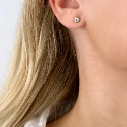 2 x 0,20 ct solitaireørestikker i 14 karat guld med diamant 